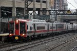 Inbound commuter approaches its station stop